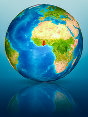 Ghana on Earth on reflective surface