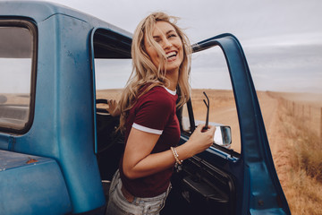 Woman taking break from the road trip