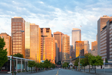 Fototapeta na wymiar Seattle, Washington State, United States - July 08, 2012: 7th Avenue and buildings of downtown at sunset.