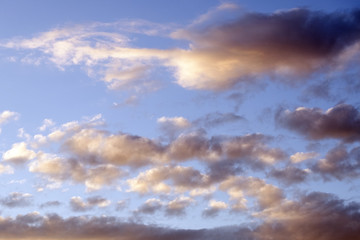 Naklejka na ściany i meble Background for the designer. Beautiful sunset blue sky with clouds.