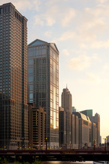 Fototapeta na wymiar Buildings at Chicago river shore and bridge of Wabash Avenue, Chicago, Illinois, USA