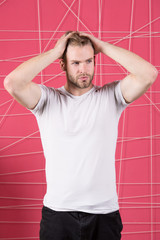 Man with bristle strict face enjoy freshness of hair, pink background. Haircare concept. Guy...