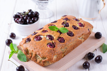 Delicious cake with fresh cherries