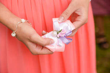 Bridesmaid hilding flowers