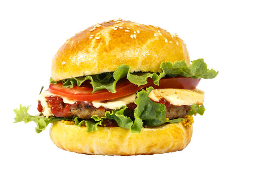 Hamburger isolated on white background with copy space. Hamburger with fresh vegetables on a white background. Burger