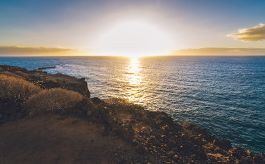 Fototapeta premium Landscape showing in the sky the colors of a sunset. In the ocean of the Canary Islands, Tenerife