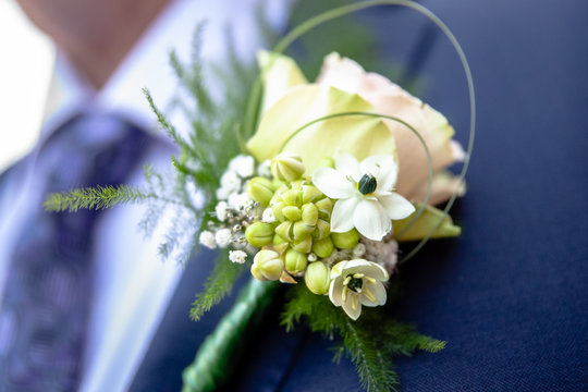 Corsage from man groom suit on wedding day.