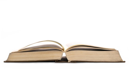 Stack of old antique big books isolated on white background