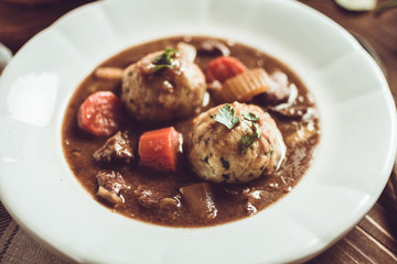 Traditional Scandinavian Venison Stew with Bacon and Onion Dumplings