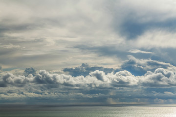 Obraz premium Cumulus clouds before the rain above the Black Sea.