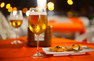Two glasses of beer with tapas