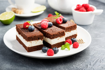 Chocolate creamy cake with  fresh berries.