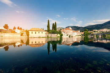 Fototapeta na wymiar Beautiful view at old town of city Trebinje and Trebisnjica river in Bosnia and Herzegovina