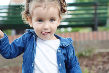 Portrait of baby girl in park.