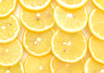 slices of lemon on background