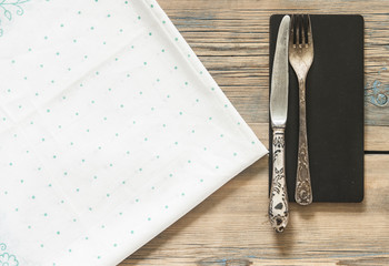 Vintage silverware on a polka dot tablecloth