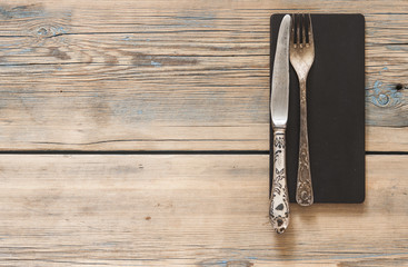 Vintage silverware on a polka dot tablecloth
