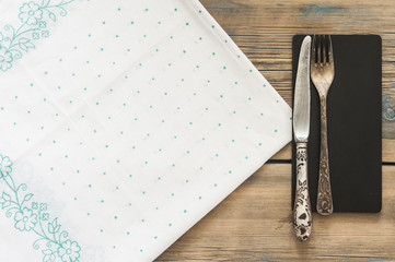Vintage silverware on a polka dot tablecloth