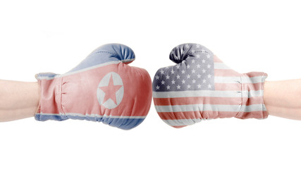 Boxing gloves with USA and North Korea flag.USA vs North Korea concept.