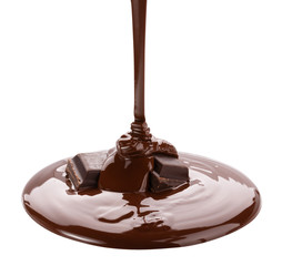 Melted chocolate flowing. Isolated on white background with clipping path