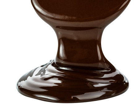 Melted chocolate flowing. Isolated on white background with clipping path