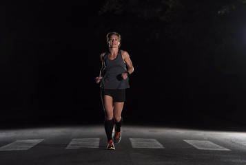 female runner training for marathon