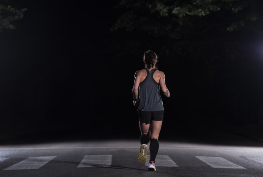 female runner training for marathon