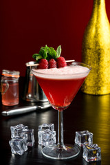 raspberry cosmopolitan martini vodka cocktail drink bar mint garnish ice bartender