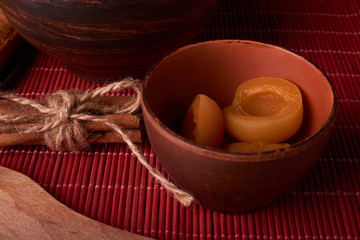 Portion of fresh pickled Apricots close-up shot selective focus