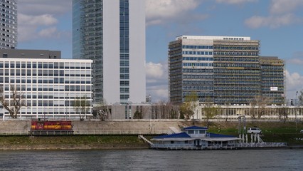 Red train, ship and buildings