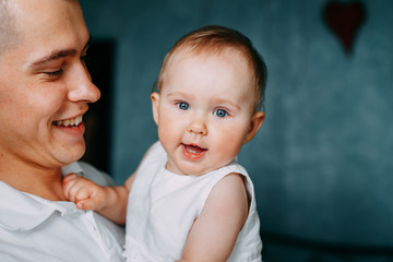 Father and daughter family portrait. Daddy and child having fun together. Close up of young happy man with adorable baby girl. Fathers day, loving parents, childhood, fatherhood