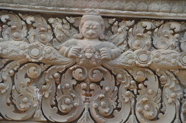 Fototapeta na wymiar ancient relief angkor cambodia temple sculpture garuda