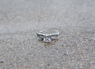 diamond ring in the sand