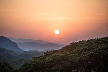 Sunset on tropical rainforest in northern Thailand