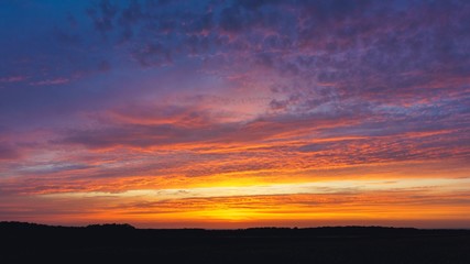 Sunrise . Sunset or sunrise with clouds, light rays and other atmospheric effect . Light from sky . 
