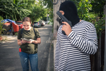 Street thief waiting tourist victim to attack robbery, Criminal and robbery concept