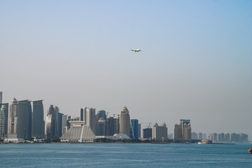 Fototapeta na wymiar Plane over Doha
