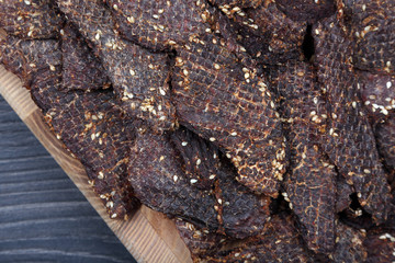 dried beef slices in spices with sesame seeds