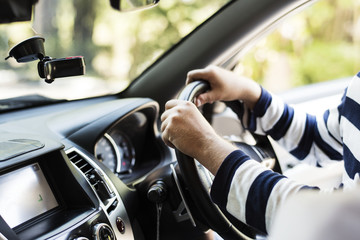 Man driving a family car