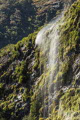 Waterfall at Milford Sound, Fiordland, New Zealand