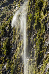 Waterfall at Milford Sound, Fiordland, New Zealand
