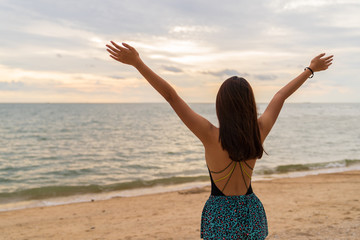 Asian beautiful woman enjoyful on the beach background.