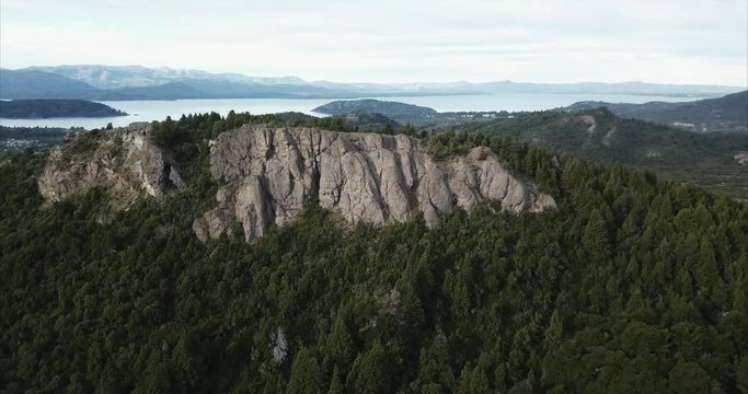 Aerial view of the horizon of the lake movement from the forest of the coihue trees to the amazong lake Nahuel Huapi, patagonia, Argentina. 4k