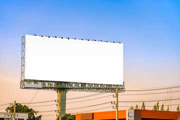 Mock up billboard canvas in city background with beautiful sunset.