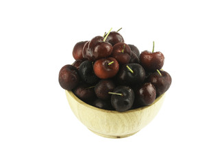 Fresh cherry with water drop in wooden bowl , isolated on white background, with clipping path..