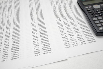 printout paper with calc on desk
