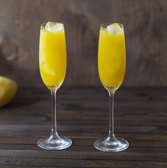 Fresh tropical fruit  mango juice on wooden background.