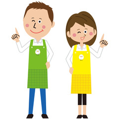 保育士の男女が指差しポーズ