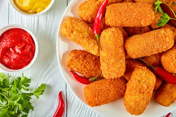 potato croquettes on a white plate
