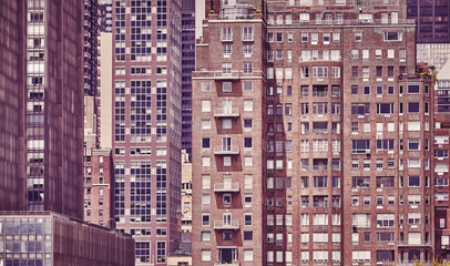 Fototapeta na wymiar Vintage toned picture of old Manhattan buildings, NYC.